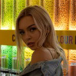 Petite teen Elizabeth Evans strips and unveils nubile body