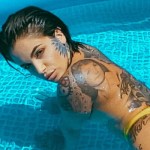 Heavily tattooed chick begs for heavy face fucking